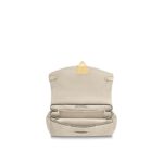 timeless day bag for the active woman.Detailed Features10.83 x 6.69 x 4.53 inches(Length x Height x Width)•Crème Beige•Embossed supple grained cowhide leather and supple grained cowhide leather•Supple grained cowhide leather trim•Microfiber lining•Gold-color hardware•Magnetic signature lock•Top handle for hand or elbow carry•Removable