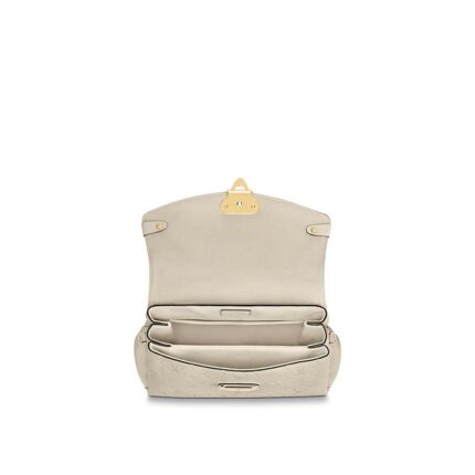 timeless day bag for the active woman.Detailed Features10.83 x 6.69 x 4.53 inches(Length x Height x Width)•Crème Beige•Embossed supple grained cowhide leather and supple grained cowhide leather•Supple grained cowhide leather trim•Microfiber lining•Gold-color hardware•Magnetic signature lock•Top handle for hand or elbow carry•Removable