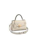 This Georges BB bag offers a sophisticated way to wear Louis Vuitton's most iconic motif: embossed Monogram Empreinte leather is combined with supple grained cowhide. The secure signature clasp is inspired by the locks on the House's historic trunks. Multiple carry options and a spacious double interior make this a practical