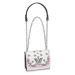 Louis Vuitton reinvents the flowers and arabesques of classic paisley on this Twist PM handbag. Printed on the supple Epi leather