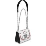 max. 56 cm/22 inches) with leather pad for shoulder or cross body carry•Transforming signature LV twist-lock•Inside flat pocket with removable mirror•Large inside pocket