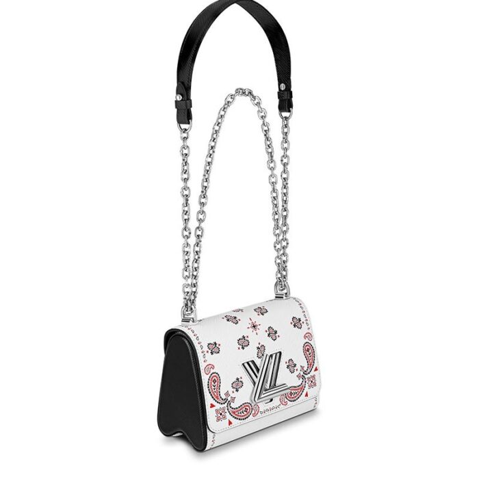 max. 56 cm/22 inches) with leather pad for shoulder or cross body carry•Transforming signature LV twist-lock•Inside flat pocket with removable mirror•Large inside pocket
