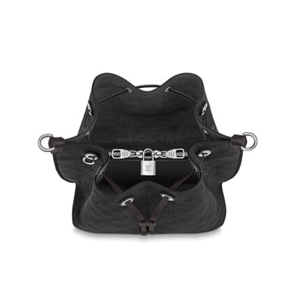 a perforated leather with a discreet Monogram motif. Supple and sophisticated