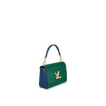 sporty-chic embroidered satin strap. Designed for a short cross-body carry