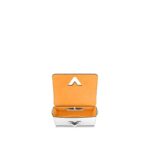 max. 56 cm/22 inches) for shoulder or cross body carry•Plexiglass handle for hand carry•Transforming signature LV Twist lock•Inside flat pocket with removable mirror•Large inside pocket