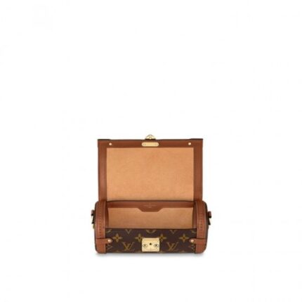 LV-embossed trunk trimmings and studs pay homage to the House’s trunkmaking beginnings.Detailed Features7.5 x 3.5 x 3.5 inches(Length x Height x Width)•Monogram coated canvas•Cowhide-leather trim•Microfiber lining•Gold-color hardware•S-lock closure•Strap:Removable