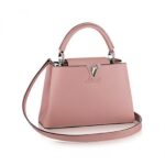 the elegant Capucines MM bag is a testament to fine leather craftsmanship. In full-grain Taurillon leather