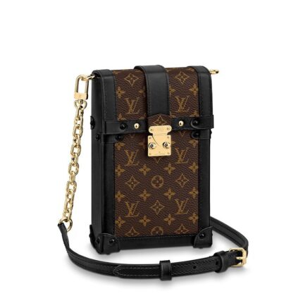 The Pochette Trunk Verticale reinterprets the iconic Essential Trunk small purse in a practical vertical format. Crafted from Monogram canvas and black calf leather