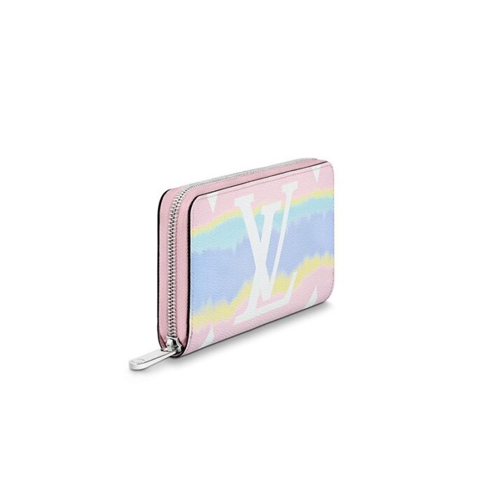 Louis Vuitton's iconic Zippy wallet is revisited as part of the LV Escale collection of leather goods and accessories. Crafted from Monogram Giant canvas