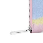 it is printed with a tie-dye effect inspired by the ancient Japanese Shibori technique. This secure wallet unzips to reveal multiple pockets