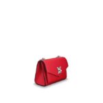 the bag's long chain strap can be doubled for short-shoulder carry or worn cross-body. A sleek choice for every day