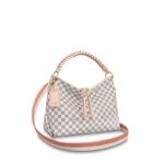 The Beaubourg Hobo MM bag in Damier Azur coated canvas sports an exquisite braided top handle for Summer 2020. The two-tone removable strap and hand-painted edge-dying on the top handle’s braided leather perfectly complement the bag’s sophisticated lines. It looks as good on the elbow as over the shoulder.