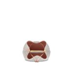 the NéoNoé bucket bag in Damier Azur canvas features a braided-leather top handle. The hand-painted edge-dyeing of the top-handle leather is a gauge of the House's commitment to craftsmanship. It can be hand-carried or worn over the shoulder and cross-body