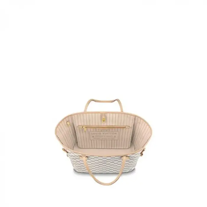 with side laces that cinch for a sleek allure or loosen for a casual look. The slim leather handles slip easily over the shoulder or arm. Lined in colorful textile