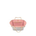with side laces that cinch for a sleek allure or loosen for a casual look. The slim leather handles slip easily over the shoulder or arm. Lined in colorful textile