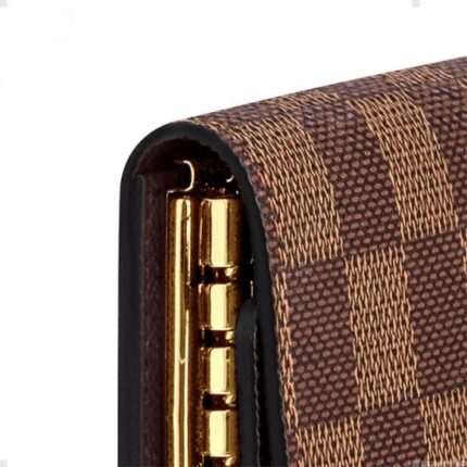 this compact case is a natural accessory for handbag or briefcase and holds six keys.Detailed Features10.5 x 7 x 2 cm(Length x Height x Width)•Coated Canvas•Grained Calf Leather lining•Snapped closure•Golden brass pieces•Holds 6 keysMore Information