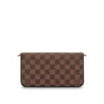it can be transformed into a glamorous shoulder bag or clutch thanks to its removable golden chain.Detailed Features•8.4 x 4.5 x 1.2 inches•Damier Ebene Coated Canvas exterior•Coated Canvas & Cowhide Leather trim•Contrasted textile lining•Shiny gold colored metallic pieces•Inside flat pocket•Large compartment•2 removable parts: zip pocket & flat pocket with 8 credit card slots•Removable golden metallic chain for shoulder or cross-body carry•Press-stud closure•Made in France or Made in Spain