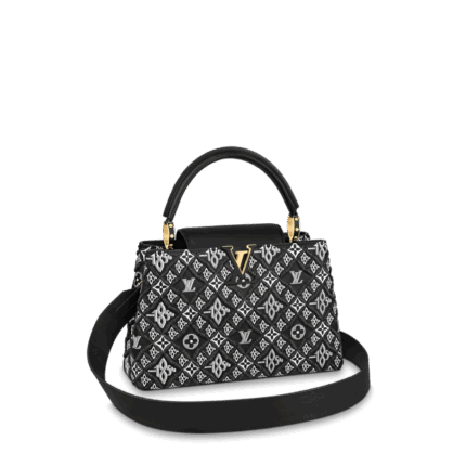 The Capucine MM is made of supple calf leather embroidered with Nicolas Ghesquière's newly designed "Since 1854" pattern. The pattern combines the traditional Monogram flower motif