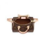 it features two handles and a long strap for shoulder or cross-body carry. Extremely lightweight and large enough for a smartphone