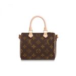 The Nano Speedy is a perfect miniature version of Louis Vuitton's iconic Speedy bag. Crafted from Monogram canvas with natural leather trim
