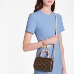 it is a stylish way to carry essentials.Detailed Features16 x 12.5 x 10 cm(Length x height x width )•Monogram coated canvas•Natural cowhide-leather trim•Textile lining•Gold-color hardware•Zip closure•Secure zipped closure•Strap: Not removable
