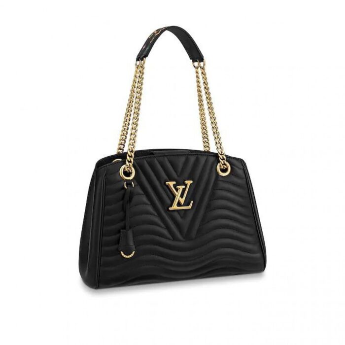 The Louis Vuitton New Wave Chain Tote in soft calf leather is both on-point and practical: with its luxe quilted detailing and aged-metal hardware