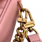 featuring an embroidered “Louis Vuitton” signature