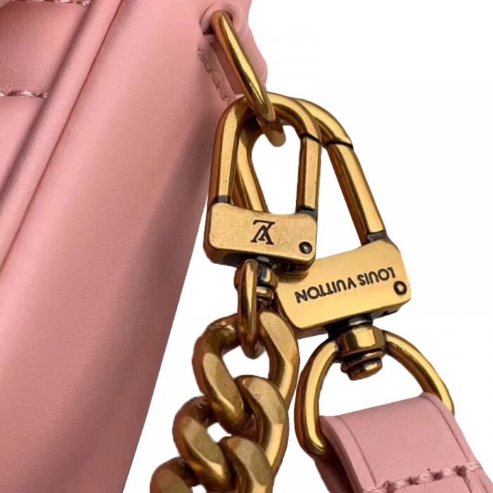 featuring an embroidered “Louis Vuitton” signature