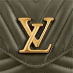 featuring an embroidered “Louis Vuitton” signature