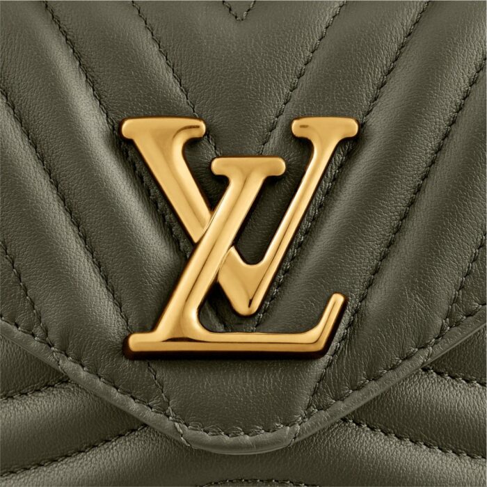 featuring an embroidered “Louis Vuitton” signature