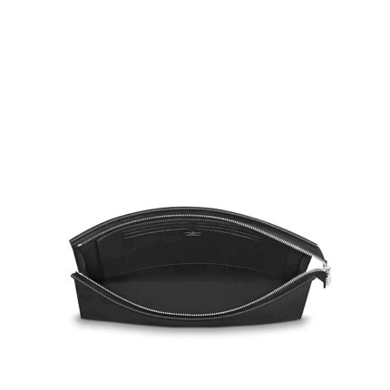 the Pochette Voyage can be carried in the hand or slipped inside a larger bag for travel. Spacious and structured