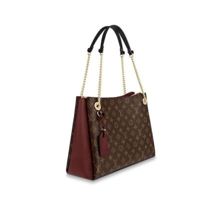 with colored-leather details on the sides and the name tag attached to the eyelet