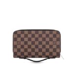 it can be carried by the handle for a sophisticated look.DETAILED FEATURES23.0 x 15.0 x 4.0 cm(Length x heightx width)•5.9 x 9 x 1.5 inches•Coated Canvas•Cowhide Leather lining•Silver color metal pieces•16 credit cards slots•3 gusseted compartments•1 large zipped compartment for coins•1 pocket for phone (iPhone 6/Samsung S6)•2 flat compartments for bills and tickets•Made in France or Made in Spain