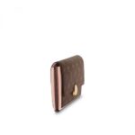 which is partially covered in leather. The long wallet boasts multiple practical features