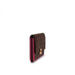 microfiber-lined pocket to hold a phone.DETAILED FEATURES•8 x 4.3 x 1.2 inches•16 CC slots•1 large zipped coin pocket•2 gusseted compartments•1 microfiber pocket to hold a phone•1 inside flat pocket•1 outside flat pocket•Monogram coated canvas and calf leather•Calf leather and microfiber lining•Shiny golden color metallic pieces•Made in France or Made in SpainMore Information