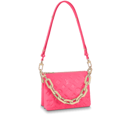 The Coussin BB is part of the LV Rose Fluo capsule collection by Nicolas Ghesquière. It is finished in eye-catching fluorescent pink calf leather embossed with a Monogram pattern. A chunky gold-colored chain and pink leather shoulder strap complement21 x 16 x 7 cm