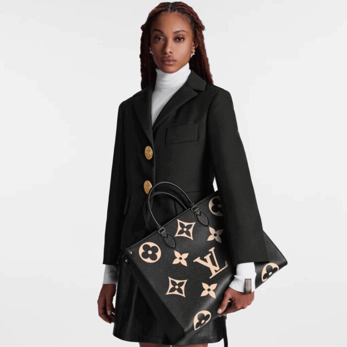 embossed with oversized Monogram Flowers and the LV Initials. A stylish and versatile bag for business
