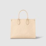 sans-serif; font-size: 18px; letter-spacing: 0.4px; background-color: #ffffff;">The OnTheGo MM tote now comes in cream-color Monogram Empreinte leather with a matching microfiber lining. The Monogram embossed into the grained leather brings a subtle elegance to the bag’s boxy shape. The roomy interior can easily fit a laptop while rolled-leather top handles and two long shoulder straps give carrying options.
