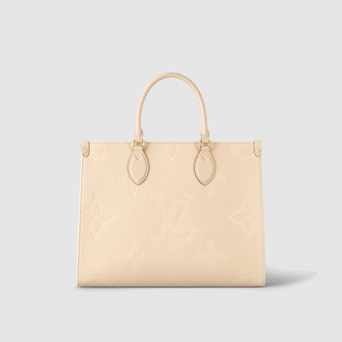 sans-serif; font-size: 18px; letter-spacing: 0.4px; background-color: #ffffff;">The OnTheGo MM tote now comes in cream-color Monogram Empreinte leather with a matching microfiber lining. The Monogram embossed into the grained leather brings a subtle elegance to the bag’s boxy shape. The roomy interior can easily fit a laptop while rolled-leather top handles and two long shoulder straps give carrying options.