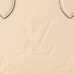 sans-serif; font-size: 18px; letter-spacing: 0.4px; background-color: #ffffff;">A soft cream-tone makes the Monogram Empreinte leather of this OnTheGo PM bag seem luminous. The LVs and Monogram Flowers embossed into the leather are perfectly complemented by the rectangular lines of this small tote. It can hold smaller essentials like an iPad Mini. Two rolled-leather top handles and a detachable strap give carry options.