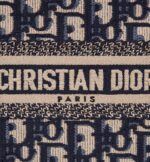 the style is entirely embroidered with the blue Dior Oblique motif