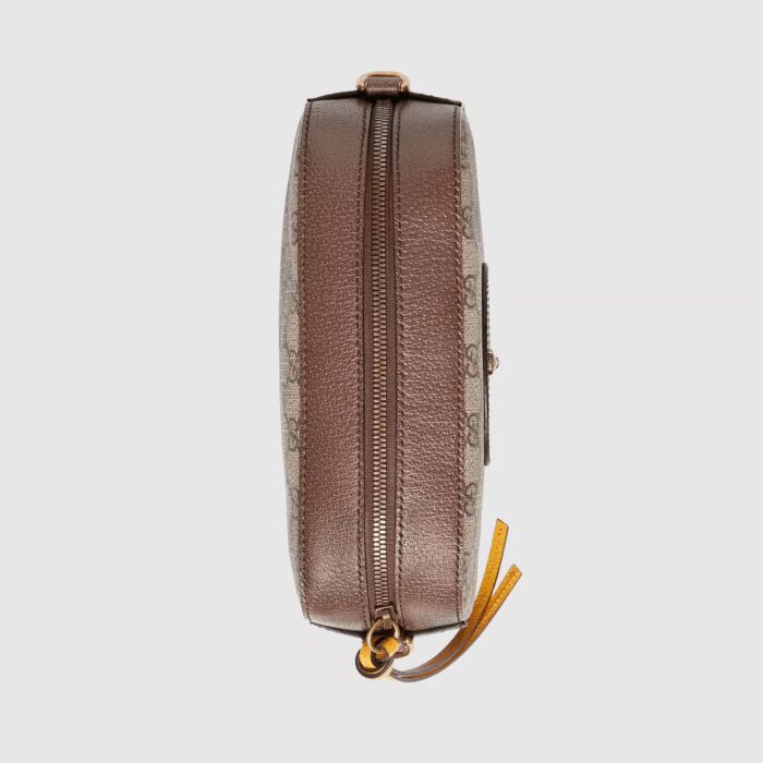 trimmed with the House Web stripe. Made in GG Supreme canvas