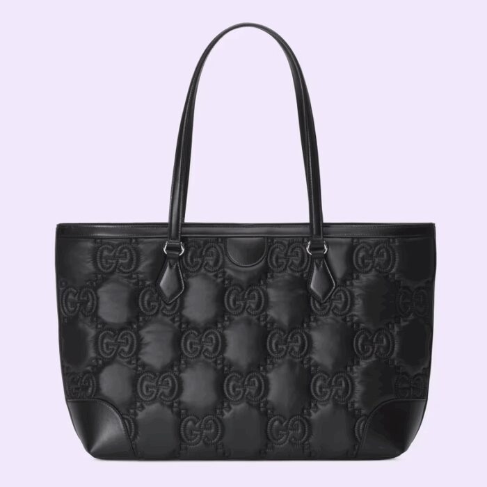 this medium sized tote is trimmed with textured leather and topped with tonal Double G hardware.