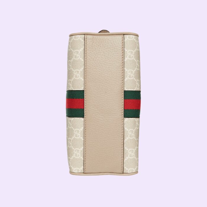 this mini top handle bag is crafted with the all-over monogram motif. Completing the logo feel