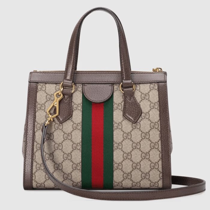an archival Gucci code from the '70s that appears atop a leather tab detail and on the zipper pull.