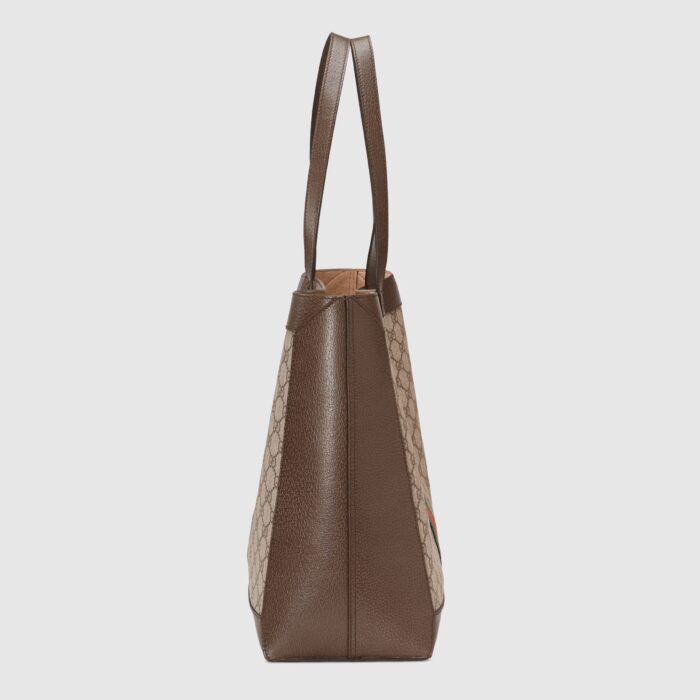 trimmed with textured leather and topped with Double G hardware. Thanks to its long leather handles
