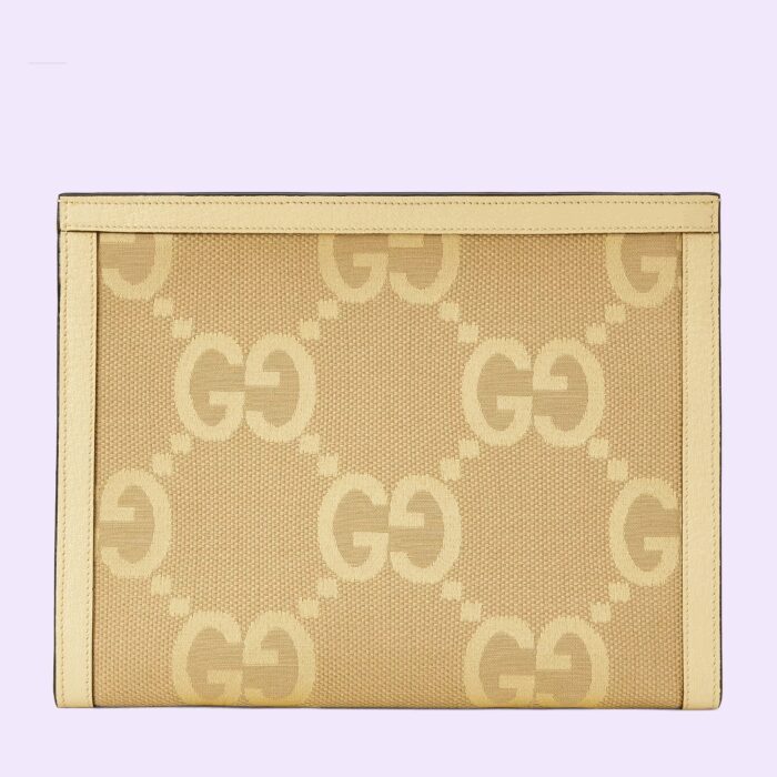 the style is crafted from monogram canvas with the GG motif appearing in a maximalist