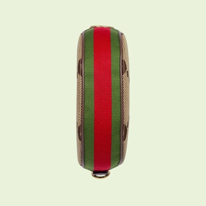 sans-serif; font-size: 16px; background-color: #ffffff;">This mini bag has a strong retro feel with a crescent shape and an oversized version of the logo graphic. This small accessory conveys the brand's deep fascination with the past. Each collection of the brand is obsessed with exploring different eras and eras