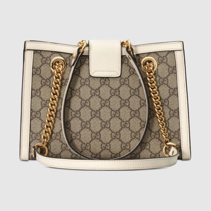 inspired by the house's archives. Keys are carried in a removable leather key pouch.