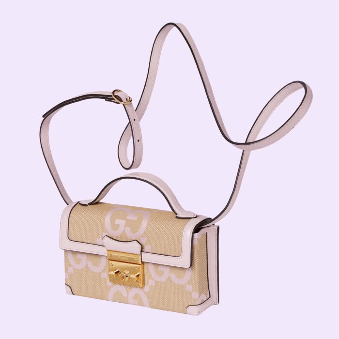 allowing it to be worn as a crossbody or shoulder bag.